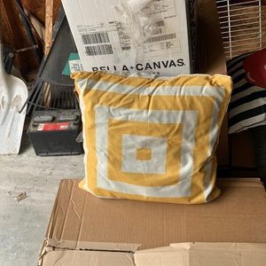 Yellow throw pillow